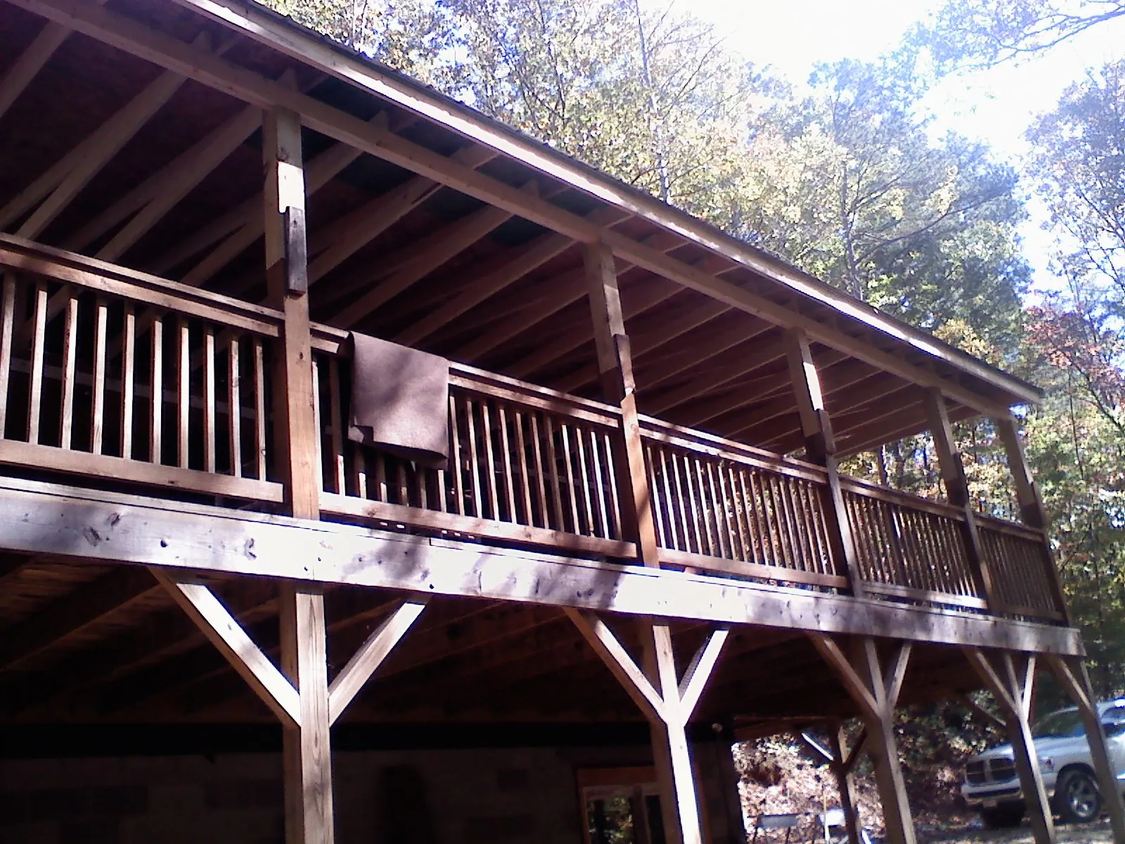 Timber framing under a new elevated porch and deck — Roof Leak Repair in Renton by Roofing Brothers